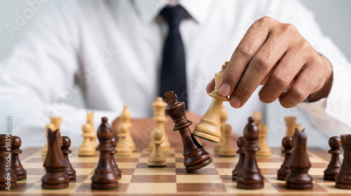 Wallpaper Mural businessman playing chess on wooden board Torontodigital.ca
