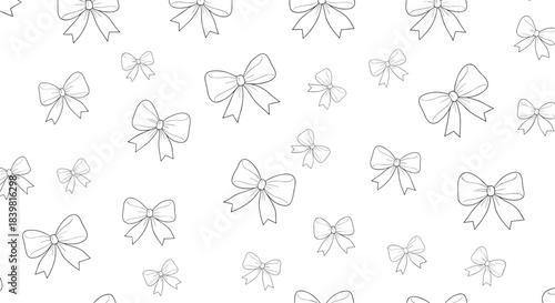 Seamless black and white pattern featuring elegantly sketched bows of varying sizes and orientations, perfect for wrapping paper or fabric design.