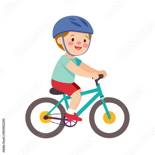 Happy little boy in helmet riding bicycle