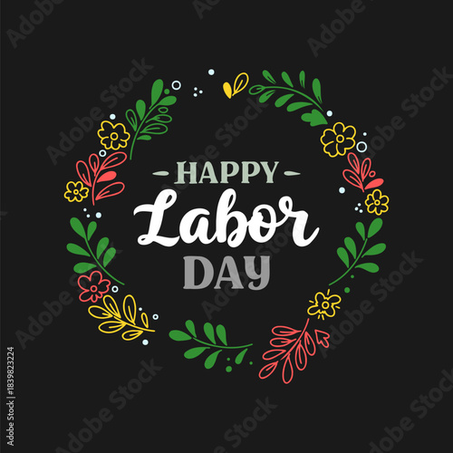 Colorful floral wreath frame with happy labor day typography on black background
