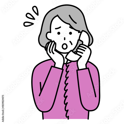 電話相談で困っている年配の女性