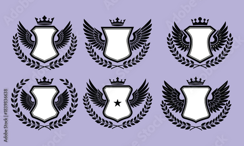 Set of heraldic shield emblems, winged badges with crown, laurel wreath, vintage coat of arms, royal crest symbols, editable vector insignia collection