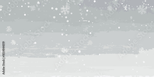 A grayscale image depicting a snowy landscape with falling snowflakes
