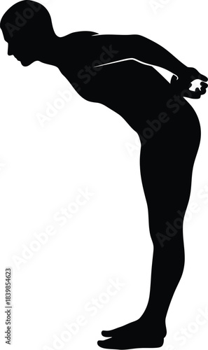 Silhouette of a person performing a forward bend stretch