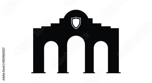 A striking black silhouette of an arched building with a shield emblem above it silhouette