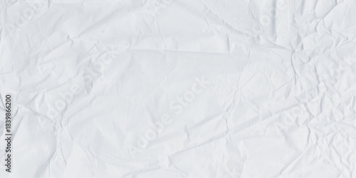 Crumple paper texture background with white effect for material sheets and rough crumple or crinkle line designs. Unique background with vintage paper texture effects and abstract patterns.