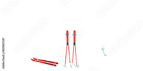 A pair of red skis and poles stand against a black background with a fish