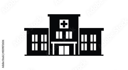 A stark black hospital building stands prominently a symbol of healthcare and support silhouette