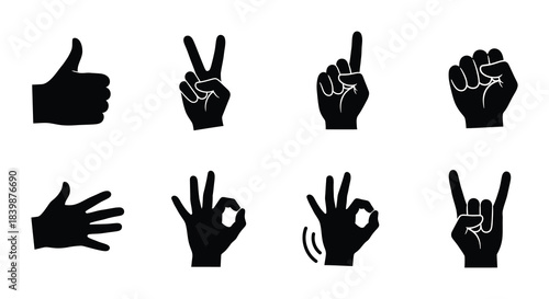 Collection of black silhouette hand gestures illustrating various signs and symbols