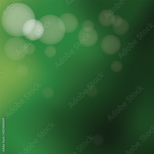 Softly blurred green background with bokeh lights creating a serene and tranquil abstract natural ambiance
