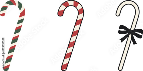 Three Candy Canes with Red Green and Cream Stripes and Black Bow christmas holiday