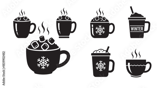 Collection of hot chocolate mugs with snowflakes and marshmallows on