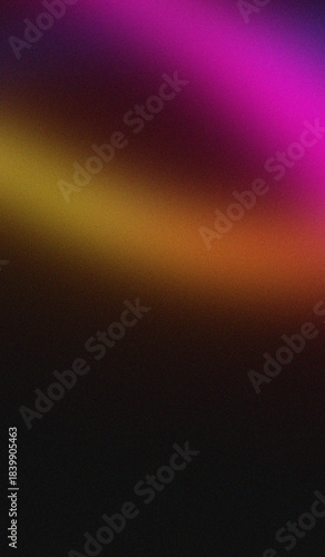 Abstract dark background featuring vibrant magenta purple and warm orange yellow light streaks with a subtle grainy texture
