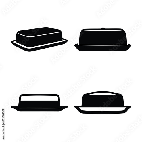 Set of four black butter dish icons on a white background