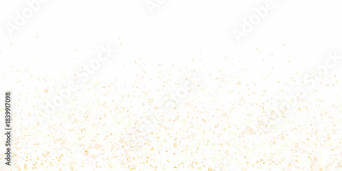 A soft blurred background featuring a delicate scattering of golden particles