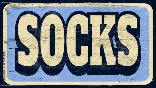 Aged and worn socks sign on wood