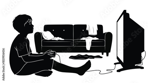 A boy sits and plays video games in front of a television set