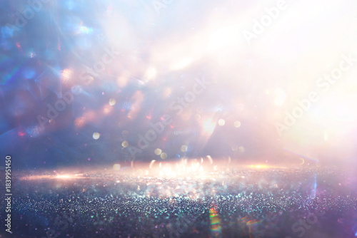 abstract glitter silver and gold lights background. de-focused