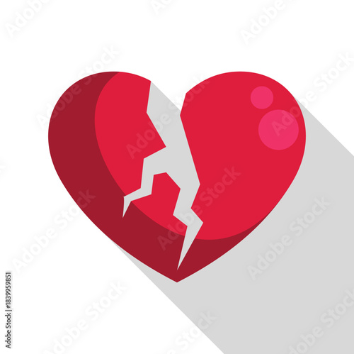 Red broken heart is breaking apart, showing long shadow and cracked surface, representing heartbreak, divorce, and sadness