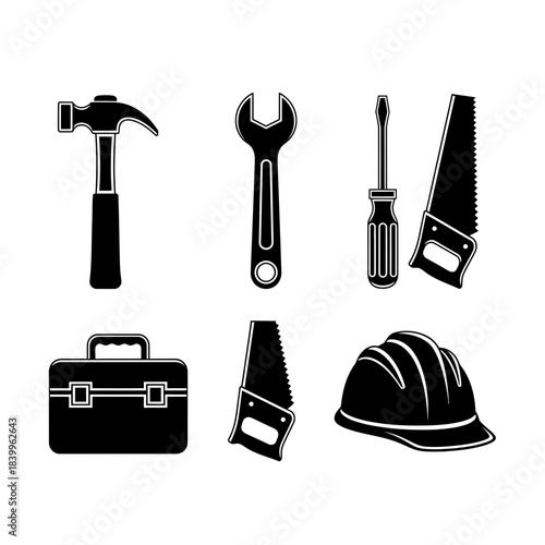 Essential tools for construction projects including a hammer, wrench, screwdriver, saws, toolbox, and safety helmet for industrial work.