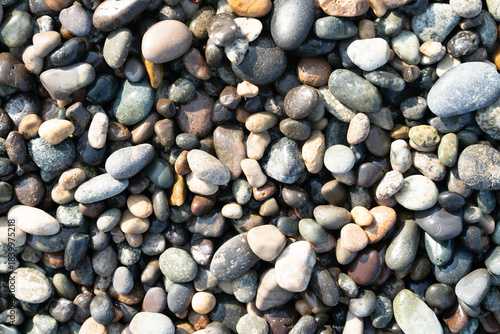 Walking along the shoreline, visitors can admire a stunning array of smooth stones, reflecting the colors of the sky and sea, enhancing the tranquil atmosphere of a spa getaway.