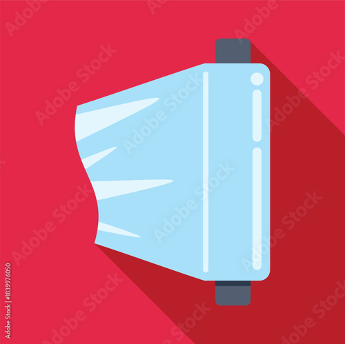 Plastic food wrap roll displaying kitchen packaging supply on red background