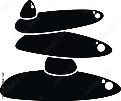 Stacked stones creating a silhouette, representing zen balance, harmony, and meditation