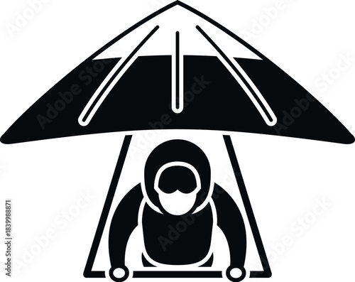 Hang gliding pilot performing an extreme sport activity in the air