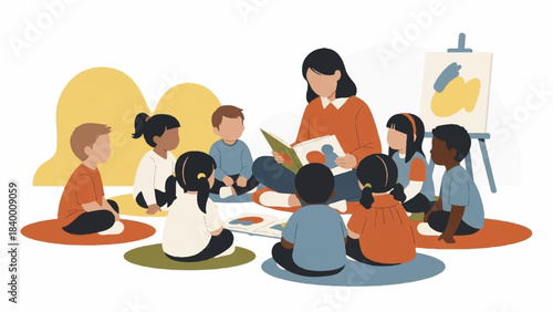 A teacher reads to a diverse group of children sitting on colorful mats in a classroom with an easel and artwork.