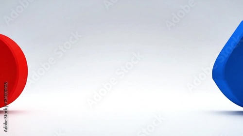 Two simple shapes (a circle and square) gently repelling and attracting.