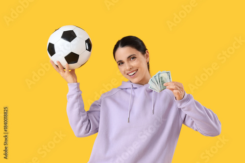 Happy young woman with mone...