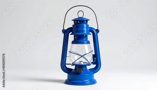 “A vintage blue kerosene lantern with glass enclosure and metal frame on white background.”