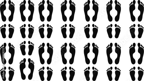 Collection of high-contrast black vector human footprint and bare foot track silhouettes in various sizes and angles, perfect for travel, spa, and graphic design backgrounds