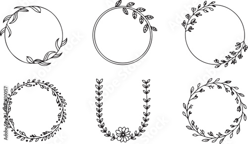 Set of delicate hand drawn leaf wreaths and botanical decorative elements