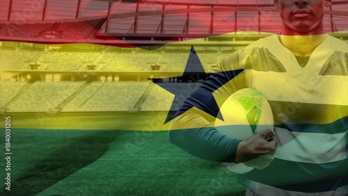 Soccer player is standing inside stadium in striped jersey holding ball in flat design, marketing