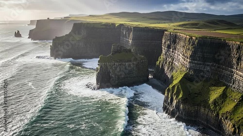 Majestic Cliffs of Moher in Ireland with Crashing Waves and Green Landscape.