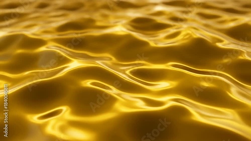 Golden liquid surface with smooth ripples and shimmering highlights evoking luxury and fluid motion