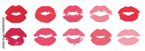 Set of ten lip imprints in diverse shades of red and pink on crisp white background