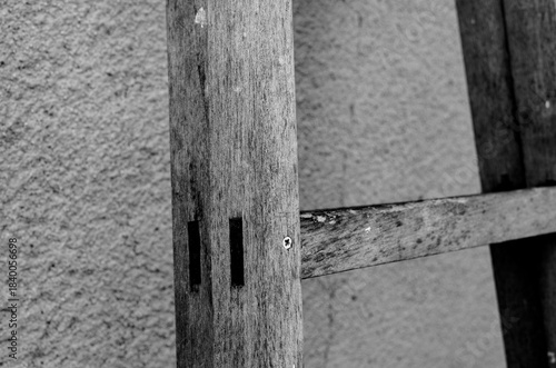 Old ladder leaning against the wall