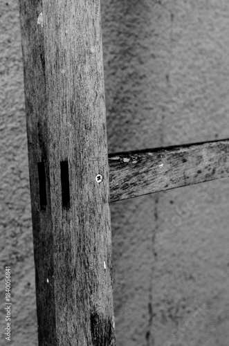 Old ladder leaning against the wall