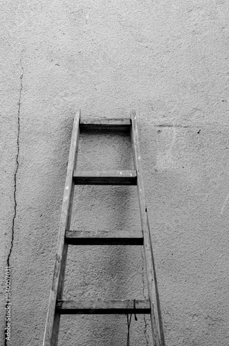 Old ladder leaning against the wall