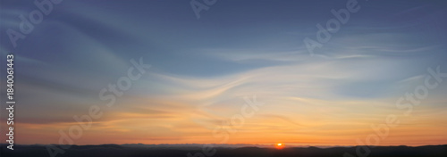 Cloudy sunset sky background with gradient from blue to yellow and orange hues. Clear horizon with sun - serene sunrise and dusk atmosphere for peaceful landscape photography or nature themed design