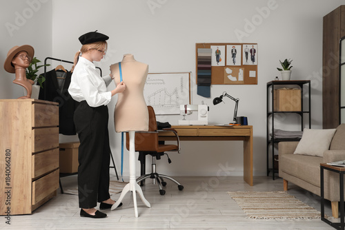 Female tailor measuring man...