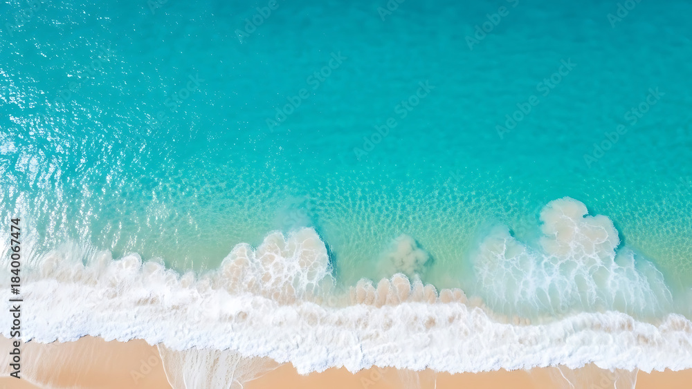 Fototapeta premium Turquoise Ocean Waves Crashing On Sandy Beach Aerial View