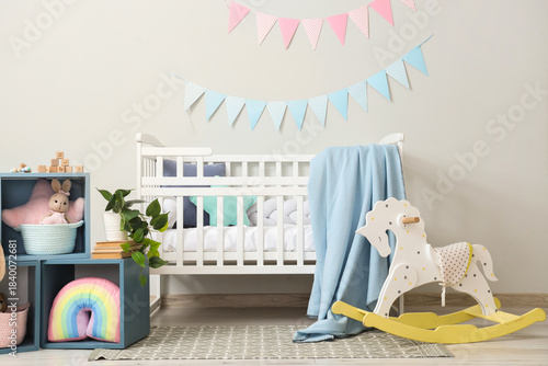Interior of nursery with cr...