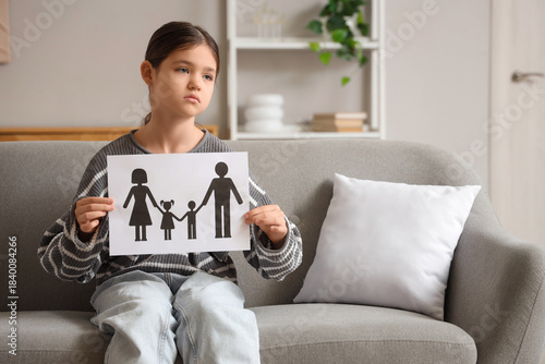 Sad girl holding paper with...