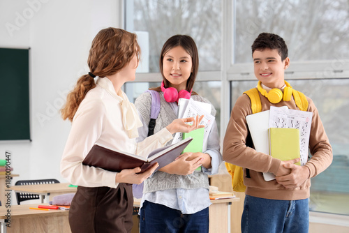 Teenage students with resul...