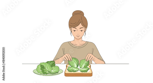 Woman Preparing a Sandwich with Fresh Lettuce: A Healthy Meal Preparation Concept