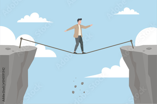 A man walks carefully on a rope stretched between two rocky cliffs, balancing with his arms as small stones fall into the chasm below.  Vector illustration.