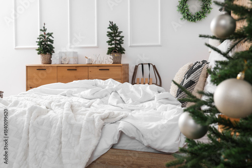 Interior of light bedroom w...